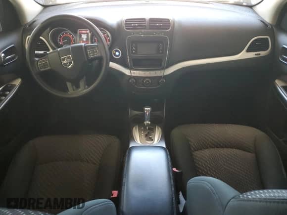 2012 Dodge Journey SXT with VIN 3C4PDCBG0CT144203, listed as a Copart auction lot 70664645 with 135,455 mi miles and Salvage title. Bid and sale history available at DreamBid. Image 8.