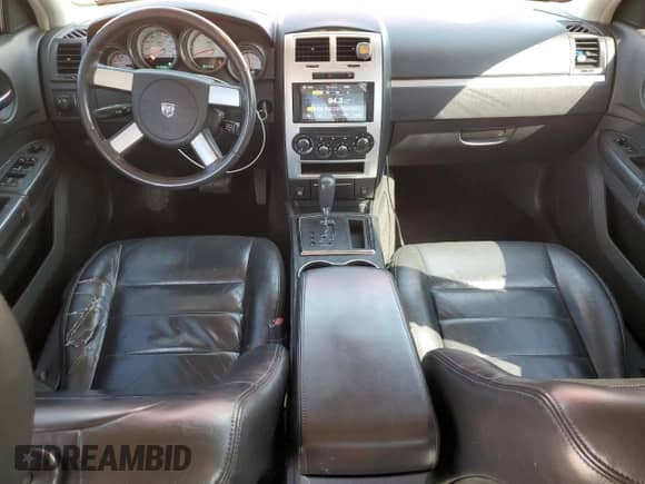 2008 Dodge Charger R/T с VIN 2B3KA53H58H132345, выставлен на аукционе Copart как лот 71262174 с пробегом 144 686 миль миль и Списание • Salvage title. История ставок и продаж доступна на DreamBid. Изображение 8.