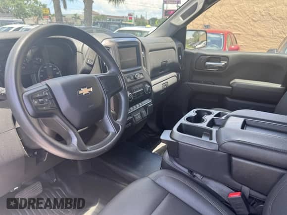 2023 Chevrolet Silverado 1500 Work Truck z VIN 3GCUDAEDXPG304501, wystawiony jako IAAI lot #42606847 z przebiegiem 30 035 mil mil oraz . Historia ofert i sprzedaży dostępna na DreamBid. Obrazek 13.