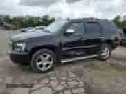 2011 Chevrolet Tahoe LTZ with VIN 1GNSKCE05BR254175, listed as a Copart auction lot 80693645 with 265,816 mi miles and Salvage title. Bid and sale history available at DreamBid. Image 1.