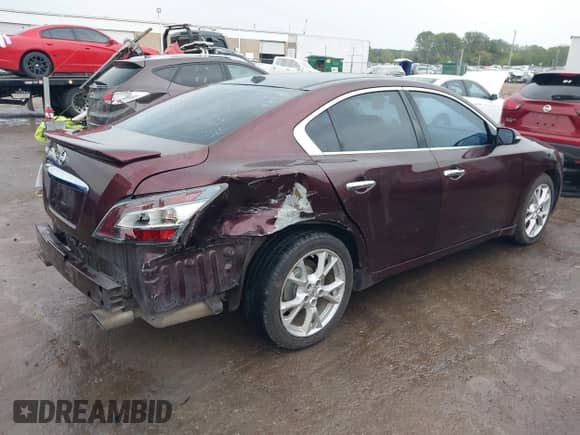 2014 Nissan Maxima SV with VIN 1N4AA5AP8EC906774, listed as a IAAI auction lot 43439683 with 126,202 mi miles and . Bid and sale history available at DreamBid. Image 4.