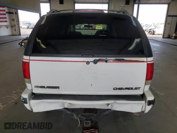 1997 Chevrolet Blazer LS with VIN 1GNDT13W6VK205047, listed as a Copart auction lot 71886215 with 189,127 mi miles and Salvage title. Bid and sale history available at DreamBid. Image 6.