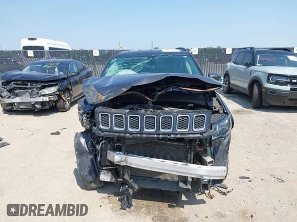 2020 Jeep Compass Limited with VIN 3C4NJCCB5LT114424, listed as a IAAI auction lot 43164924 with 99,096 mi miles and . Bid and sale history available at DreamBid. Image 12.