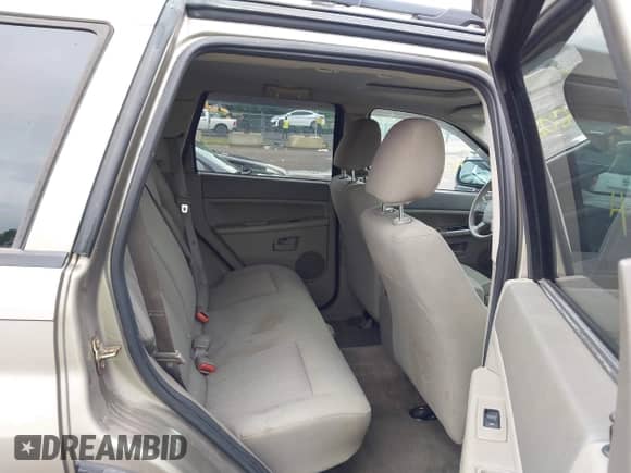 2006 Jeep Grand Cherokee Laredo z VIN 1J4HR48N46C259964, wystawiony jako IAAI lot #42698023 z przebiegiem 201 624 mil mil oraz . Historia ofert i sprzedaży dostępna na DreamBid. Obrazek 8.