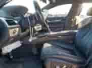 2019 BMW 7 Series 740i xDrive with VIN WBA7E4C50KGV70117, listed as a Copart auction lot 80304035 with 92,022 mi miles and Salvage title. Bid and sale history available at DreamBid. Image 7.