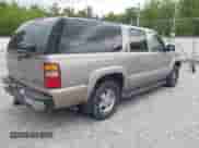 2003 Chevrolet Suburban LT with VIN 1GNEC16Z13J140136, listed as a IAAI auction lot 42142827 with 252,698 mi miles and . Bid and sale history available at DreamBid. Image 4.