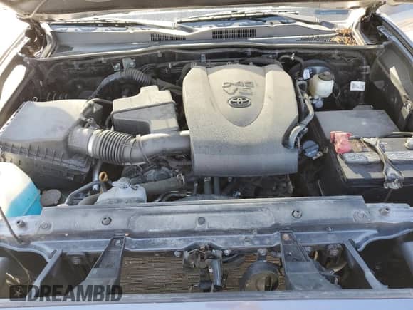 2021 Toyota Tacoma TRD Off Road with VIN 3TMCZ5AN9MM392750, listed as a Copart auction lot 70289245 with 76,487 mi miles and Salvage title. Bid and sale history available at DreamBid. Image 11.