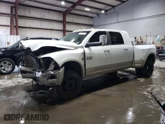 2010 Dodge 3500 Laramie with VIN 3D73Y4HL7AG193326, listed as a Copart auction lot 87431914 with 301,272 mi miles and Salvage title. Bid and sale history available at DreamBid. Image 1.