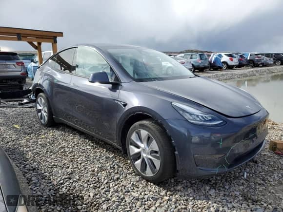 2023 Tesla Model Y Long Range z VIN 7SAYGDEE4PA147170, wystawiony jako Copart lot #48218945 z przebiegiem Nie podano mil oraz Szkoda całkowita • Salvage title. Historia ofert i sprzedaży dostępna na DreamBid. Obrazek 4.