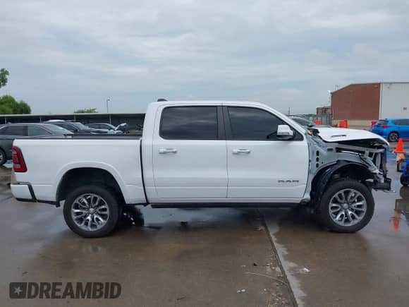 2021 Ram 1500 Laramie z VIN 1C6SRFJT6MN626727, wystawiony jako IAAI lot #42934254 z przebiegiem 79 084 mil mil oraz . Historia ofert i sprzedaży dostępna na DreamBid. Obrazek 14.