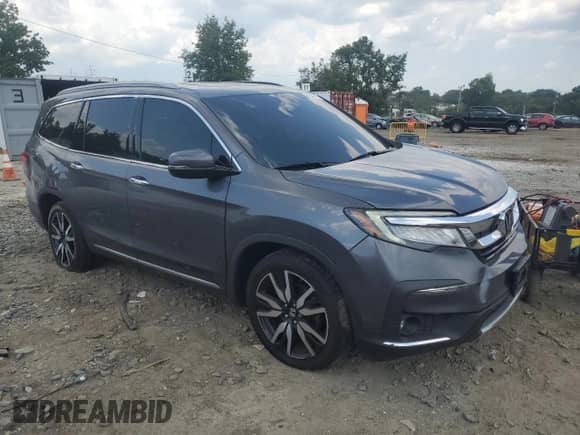 2021 Honda Pilot Touring 8-Passenger с VIN 5FNYF6H95MB048494, выставлен на аукционе Copart как лот 61347115 с пробегом 174 016 миль миль и Списание • Salvage title. История ставок и продаж доступна на DreamBid. Изображение 4.