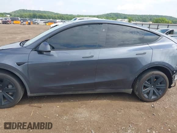 2023 Tesla Model Y Long Range with VIN 7SAYGDEE4PA202135, listed as a IAAI auction lot 42975478 with 27,065 mi miles and . Bid and sale history available at DreamBid. Image 15.
