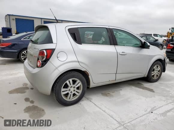 2014 Chevrolet Sonic LT с VIN 1G1JC6SB0E4211446, выставлен на аукционе Copart как лот 59143125 с пробегом 136 299 миль миль и Чистый • Clean title. История ставок и продаж доступна на DreamBid. Изображение 3.
