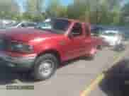 2000 Ford F-150 XL z VIN 1FTRX18L3YNB90298, wystawiony jako IAAI lot #30305838 z przebiegiem Nie podano mil oraz . Historia ofert i sprzedaży dostępna na DreamBid. Obrazek 2.