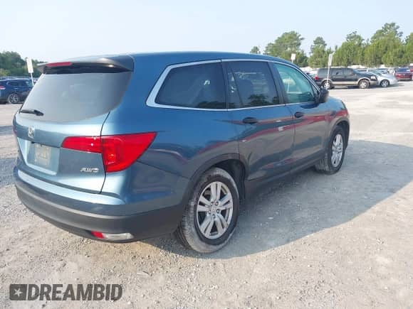 2016 Honda Pilot LX z VIN 5FNYF6H17GB092852, wystawiony jako IAAI lot #42406550 z przebiegiem 141 165 mil mil oraz . Historia ofert i sprzedaży dostępna na DreamBid. Obrazek 4.