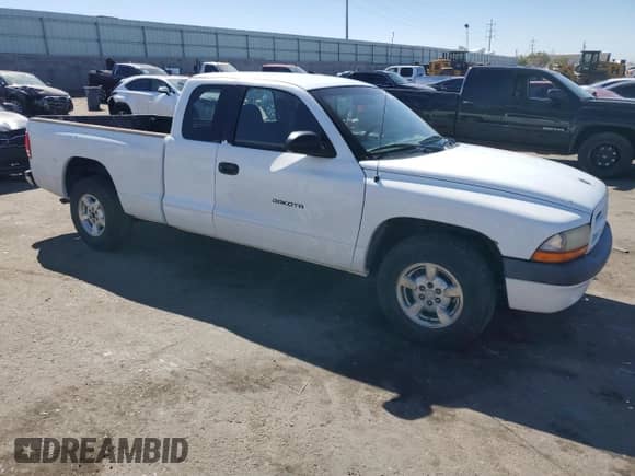 2001 Dodge Dakota with VIN 1B7FL22P81S159152, listed as a Copart auction lot 73055354 with 119,167 mi miles and Salvage title. Bid and sale history available at DreamBid. Image 4.