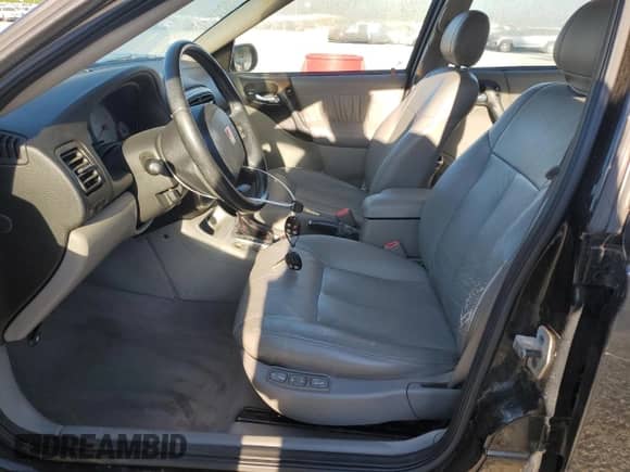 2003 Saturn LS with VIN 1G8JU54F33Y549275, listed as a Copart auction lot 70737015 with 98,210 mi miles and Clean title. Bid and sale history available at DreamBid. Image 7.