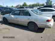 2001 Toyota Camry LE with VIN JT2BF22K010338767, listed as a Copart auction lot 59871125 with 299,672 mi miles and Salvage title. Bid and sale history available at DreamBid. Image 2.