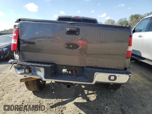 2007 Ford F-150 XL with VIN 1FTRF14V37KC39137, listed as a Copart auction lot 73463164 with 150,331 mi miles and Salvage title. Bid and sale history available at DreamBid. Image 6.