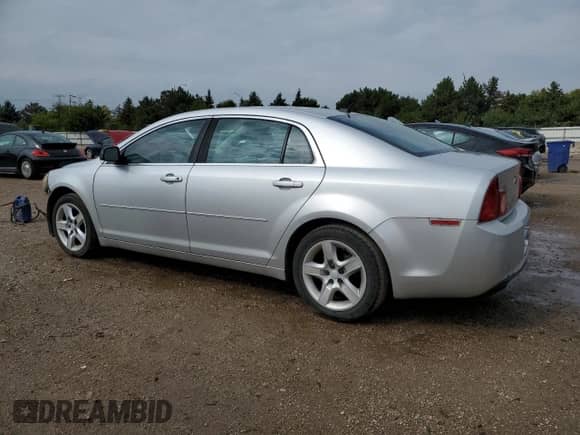 2010 Chevrolet Malibu 1LS with VIN 1G1ZB5EB5AF247546, listed as a Copart auction lot 71197135 with 137,602 mi miles and Salvage title. Bid and sale history available at DreamBid. Image 2.