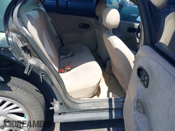 1999 Saturn SL z VIN 1G8ZK5274XZ304652, wystawiony jako IAAI lot #42618620 z przebiegiem 98 131 mil mil oraz . Historia ofert i sprzedaży dostępna na DreamBid. Obrazek 8.