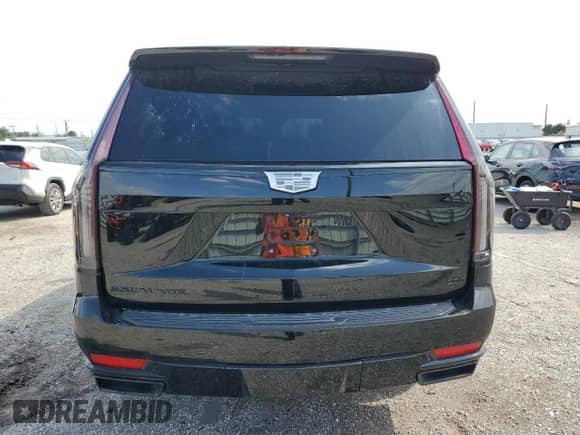2021 Cadillac Escalade z VIN 1GYS3PKL6MR288828, wystawiony jako Copart lot #78219414 z przebiegiem 22 362 mil mil oraz Czysty tytuł • Clean title. Historia ofert i sprzedaży dostępna na DreamBid. Obrazek 6.