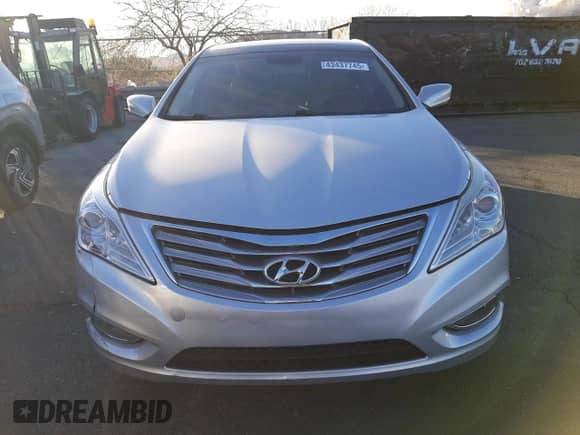 2013 Hyundai Azera с VIN KMHFH4JG7DA312804, выставлен на аукционе Copart как лот 43437745 с пробегом 156 971 миль миль и Списание • Salvage title. История ставок и продаж доступна на DreamBid. Изображение 5.