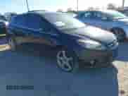 2013 Ford Focus Titanium with VIN 1FADP3N2XDL141869, listed as a IAAI auction lot 43471319 with 190,886 mi miles and . Bid and sale history available at DreamBid. Image 1.