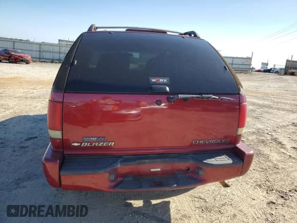 2001 Chevrolet Blazer LS с VIN 1GNCT18W61K145060, выставлен на аукционе Copart как лот 71013154 с пробегом 223 041 миль миль и Списание • Salvage title. История ставок и продаж доступна на DreamBid. Изображение 6.