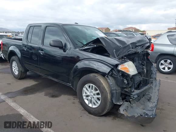 2014 Nissan Frontier Desert Runner z VIN 1N6AD0ER0EN719742, wystawiony jako IAAI lot #42202608 z przebiegiem 126 796 mil mil oraz . Historia ofert i sprzedaży dostępna na DreamBid. Obrazek 1.