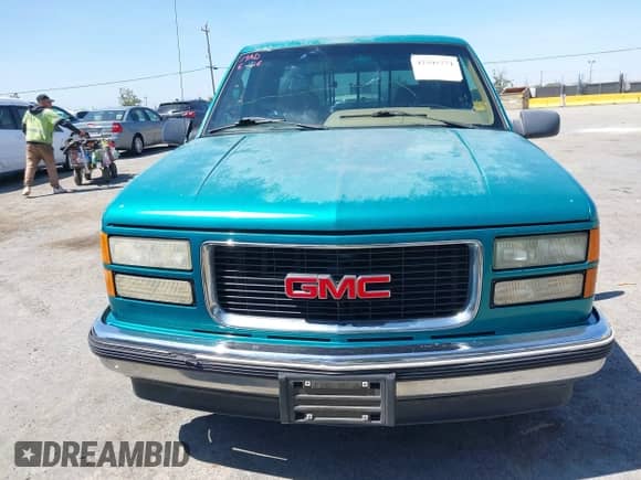 1995 GMC Sierra 1500 z VIN 2GTEC19K7S1506164, wystawiony jako IAAI lot #42595774 z przebiegiem 202 675 mil mil oraz . Historia ofert i sprzedaży dostępna na DreamBid. Obrazek 12.