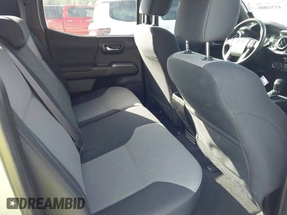 2021 Toyota Tacoma SR with VIN 3TYCZ5ANXMT024937, listed as a IAAI auction lot 43314888 with 77,580 mi miles and . Bid and sale history available at DreamBid. Image 8.