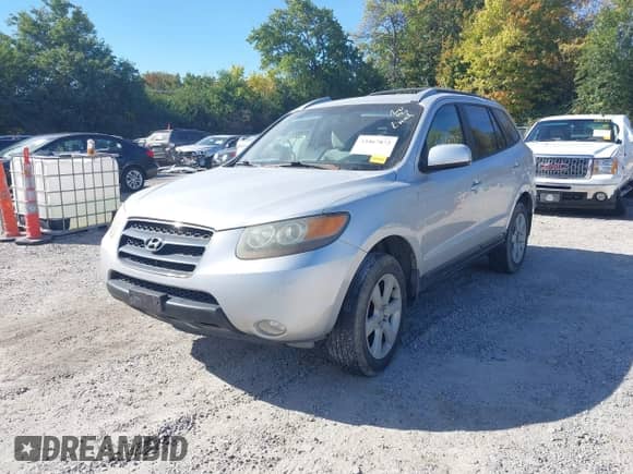 2007 Hyundai Santa Fe SE z VIN 5NMSH13EX7H006767, wystawiony jako IAAI lot #43467872 z przebiegiem 197 071 mil mil oraz . Historia ofert i sprzedaży dostępna na DreamBid. Obrazek 2.