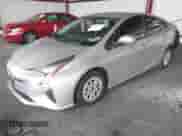 2016 Toyota Prius Two with VIN JTDKBRFU6G3017332, listed as a IAAI auction lot 43507426 with 163,501 mi miles and . Bid and sale history available at DreamBid. Image 2.