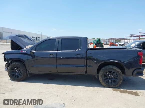 2024 Chevrolet Silverado 1500 RST with VIN 1GCUDEED8RZ166452, listed as a IAAI auction lot 43095521 with 50,889 mi miles and . Bid and sale history available at DreamBid. Image 14.