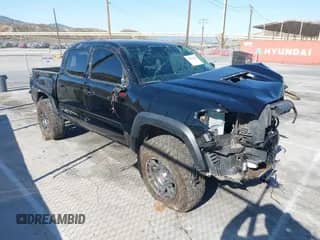 2018 Toyota Tacoma SR with VIN 5TFCZ5AN6JX156482, listed as a IAAI auction lot 42643556 with 112,895 mi miles and . Bid and sale history available at DreamBid. Image 1.