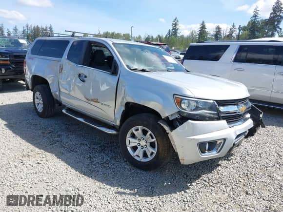2015 Chevrolet Colorado 4WD LT z VIN 1GCHTBE38F1164026, wystawiony jako IAAI lot #42213134 z przebiegiem 99 118 mil mil oraz . Historia ofert i sprzedaży dostępna na DreamBid. Obrazek 1.