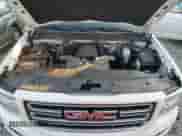 2018 GMC Sierra 1500 z VIN 1GTR1LEC3JZ341513, wystawiony jako Copart lot #77564244 z przebiegiem 56 873 mil mil oraz Szkoda całkowita • Salvage title. Historia ofert i sprzedaży dostępna na DreamBid. Obrazek 11.