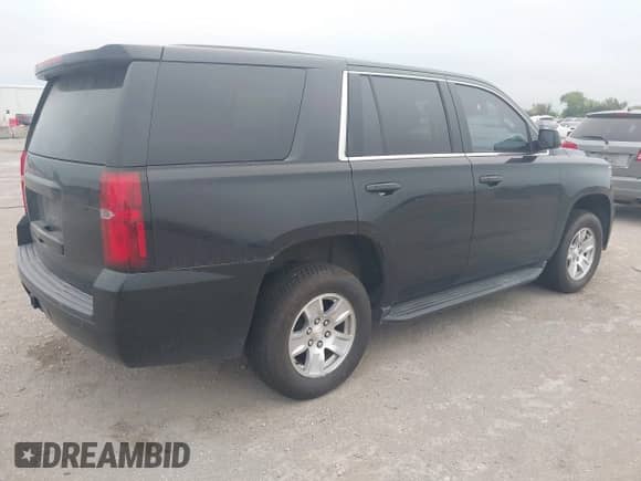 2016 Chevrolet Tahoe with VIN 1GNLCDKC8GR303575, listed as a IAAI auction lot 43073330 with 192,880 mi miles and . Bid and sale history available at DreamBid. Image 4.