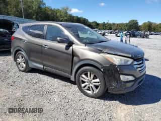 2013 Hyundai Santa Fe Sport z VIN 5XYZU3LA5DG124041, wystawiony jako Copart lot #86317095 z przebiegiem 155 372 mil mil oraz Czysty tytuł • Clean title. Historia ofert i sprzedaży dostępna na DreamBid. Obrazek 4.