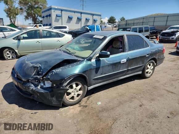 2000 Honda Accord SE with VIN JHMCG669XYC022808, listed as a Copart auction lot 66813555 with 164,406 mi miles and Salvage title. Bid and sale history available at DreamBid. Image 1.