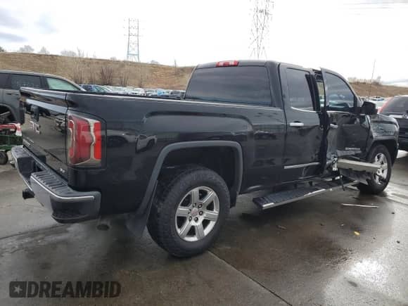 2017 GMC Sierra 1500 SLT z VIN 1GTV2NEJ7HZ348013, wystawiony jako Copart lot #86545954 z przebiegiem 100 463 mil mil oraz Szkoda całkowita • Salvage title. Historia ofert i sprzedaży dostępna na DreamBid. Obrazek 3.
