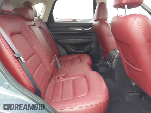 2023 Mazda CX-5 S Carbon Edition z VIN JM3KFBCM1P0132803, wystawiony jako IAAI lot #43128566 z przebiegiem 37 967 mil mil oraz . Historia ofert i sprzedaży dostępna na DreamBid. Obrazek 8.