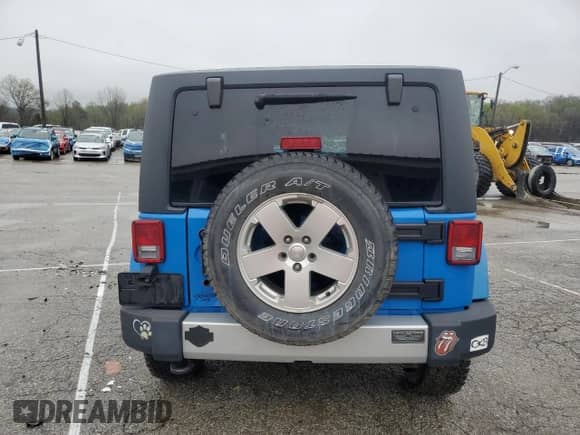 2012 Jeep Wrangler Arctic z VIN 1C4AJWBG3CL148046, wystawiony jako Copart lot #54186285 z przebiegiem 156 639 mil mil oraz Szkoda całkowita • Salvage title. Historia ofert i sprzedaży dostępna na DreamBid. Obrazek 6.