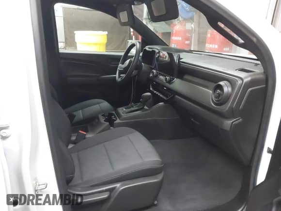 2024 Chevrolet Colorado 2WD Work Truck with VIN 1GCGSBEC8R1213406, listed as a IAAI auction lot 41740445 with 13,072 mi miles and . Bid and sale history available at DreamBid. Image 5.