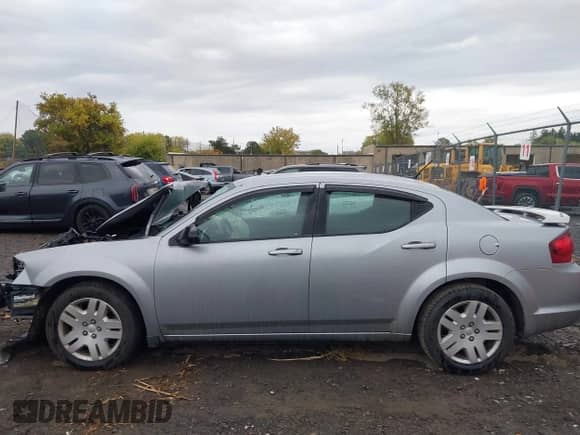 2013 Dodge Avenger SE with VIN 1C3CDZAB5DN771735, listed as a IAAI auction lot 43395877 with 87,931 mi miles and . Bid and sale history available at DreamBid. Image 15.