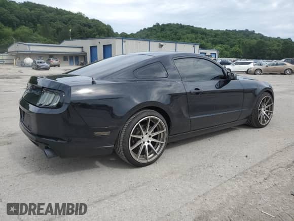 2014 Ford Mustang V6 with VIN 1ZVBP8AMXE5319384, listed as a Copart auction lot 63340345 with 63,255 mi miles and Salvage title. Bid and sale history available at DreamBid. Image 3.