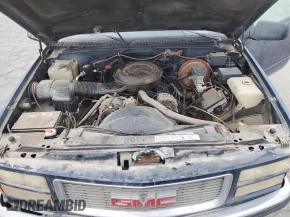 1995 GMC Sierra 1500 z VIN 2GTEC19K0S1537997, wystawiony jako Copart lot #85018174 z przebiegiem 240 831 mil mil oraz Czysty tytuł • Clean title. Historia ofert i sprzedaży dostępna na DreamBid. Obrazek 11.