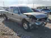 2002 GMC Sierra 1500 SLE with VIN 2GTEK19T221349140, listed as a Copart auction lot 64810515 with 292,503 mi miles and Salvage title. Bid and sale history available at DreamBid. Image 4.