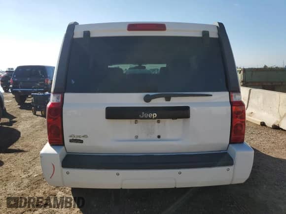 2007 Jeep Commander Sport z VIN 1J8HG48K27C567128, wystawiony jako Copart lot #80455145 z przebiegiem 159 037 mil mil oraz Szkoda całkowita • Salvage title. Historia ofert i sprzedaży dostępna na DreamBid. Obrazek 6.